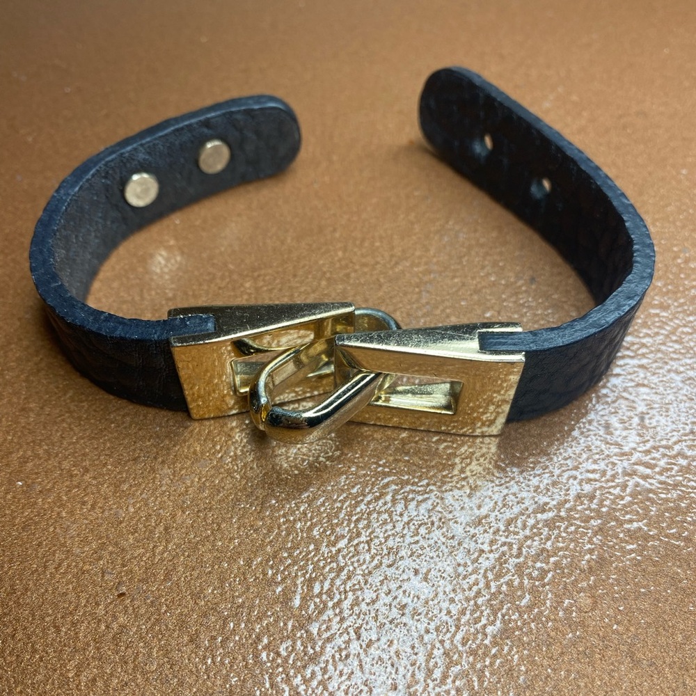Black and Gold chain link bracelet with snap closures.